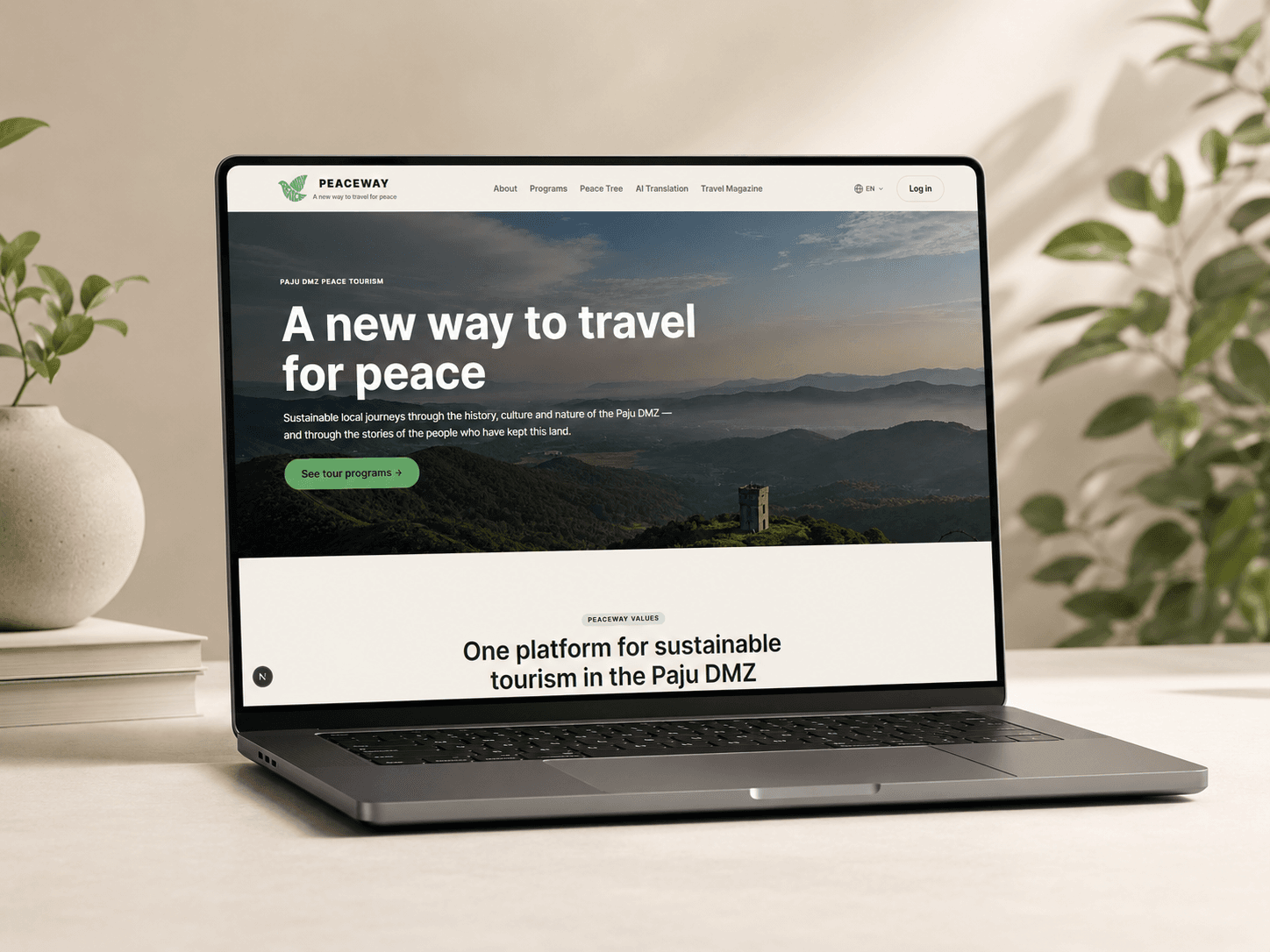 PEACEWAY 홈페이지 — 노트북 목업, 'A new way to travel for peace'